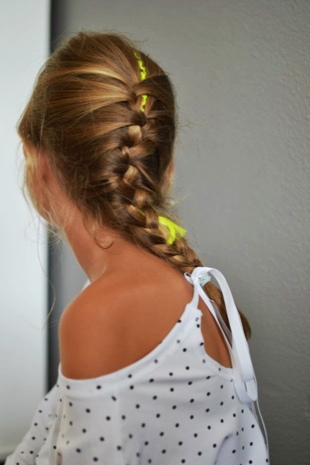 A top with a surprising back